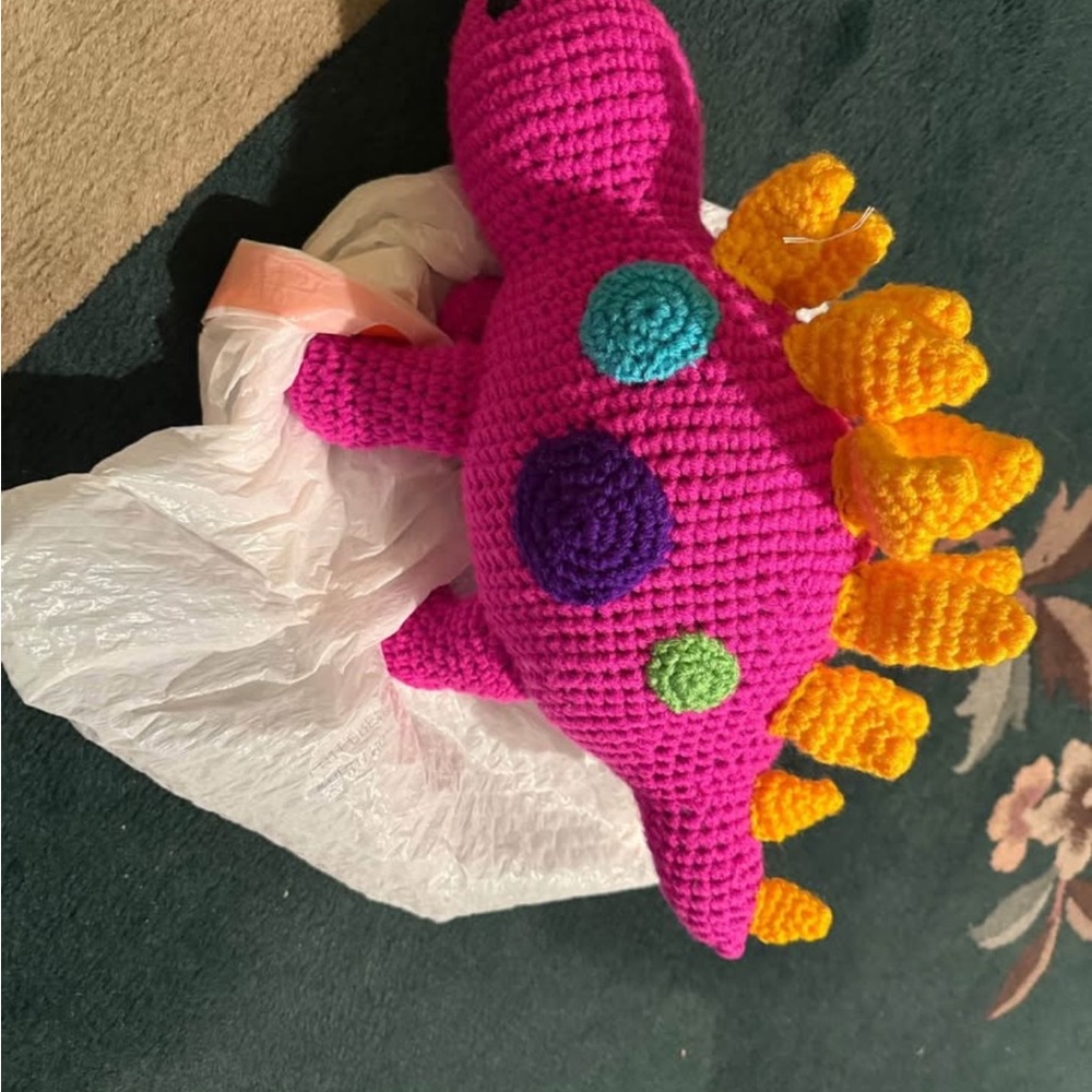 Dinosaur colorful, crocheted, fun dinosaur. Perfect for a unique gift.